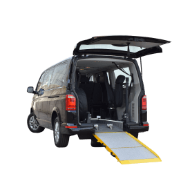 A wheelchair accessible transfer vehicle